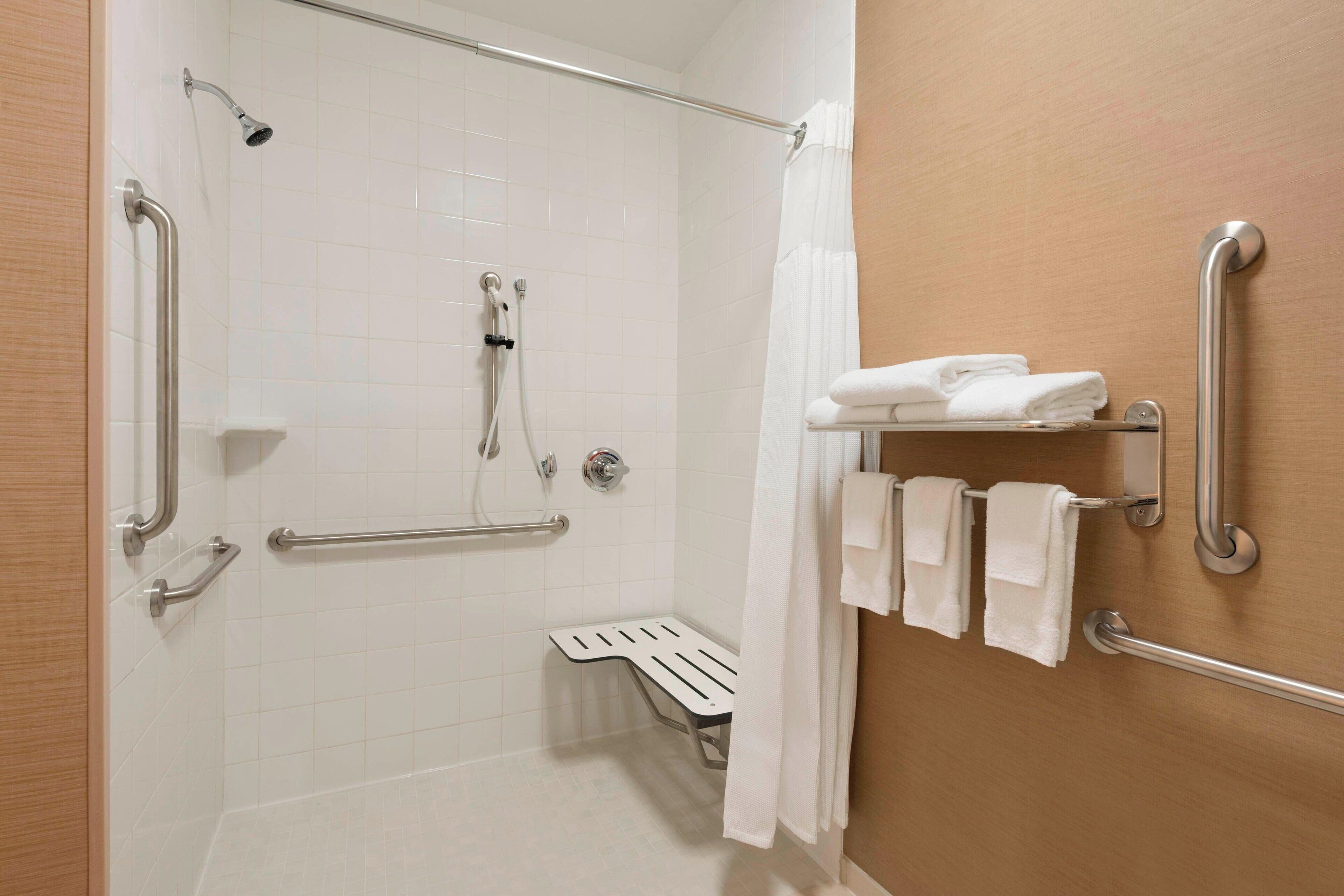 combined shower/bathtub, free toiletries, hair dryer, towels