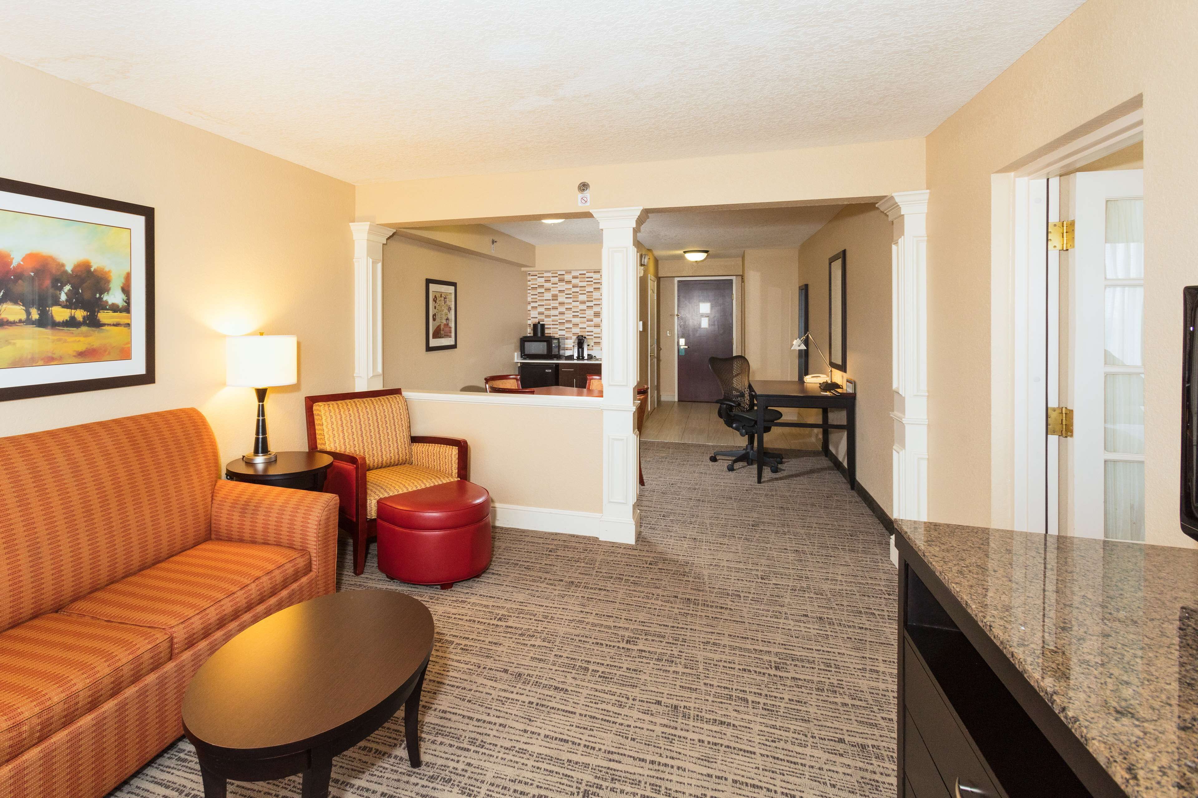 one bedroom suite, one king bed | living area | tv, video game console, pay films, mp3 dock