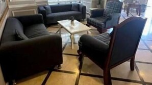 A room with a sectional sofa, two armchairs, a coffee table, and a patterned floor. - Albatros Premier Hotel - Special Class (Istanbul)
