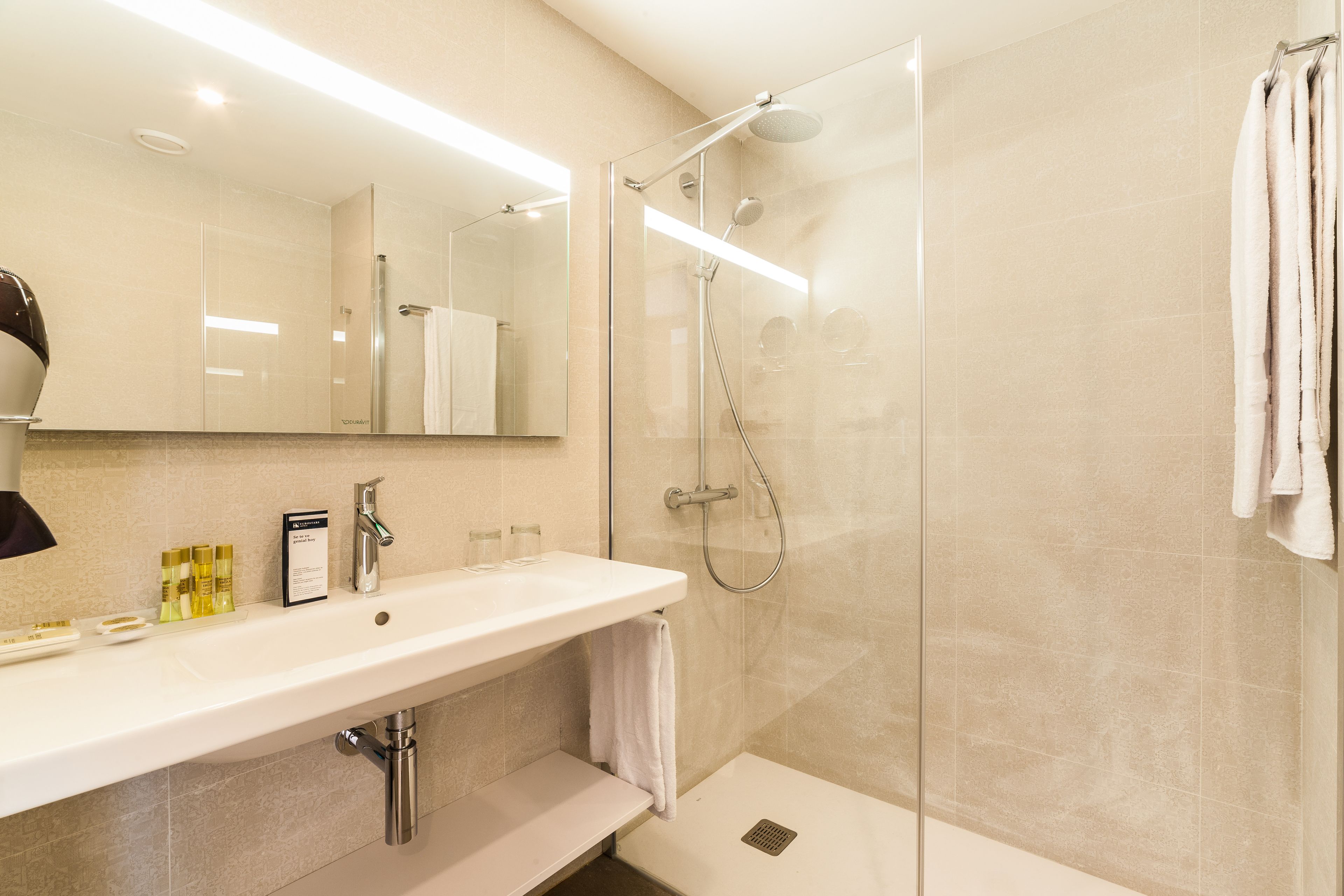 shower, eco-friendly toiletries, hair dryer, towels