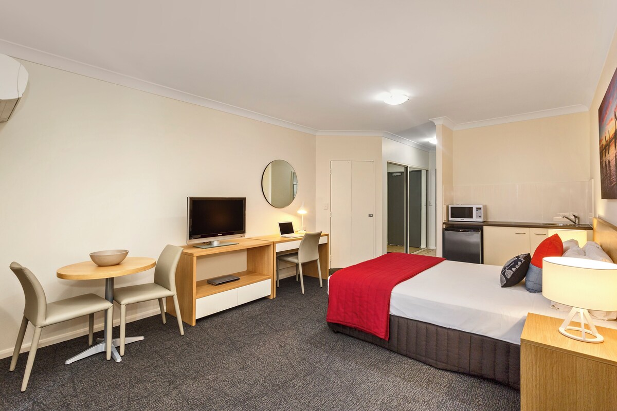 Premium bedding, desk, blackout curtains, iron/ironing board