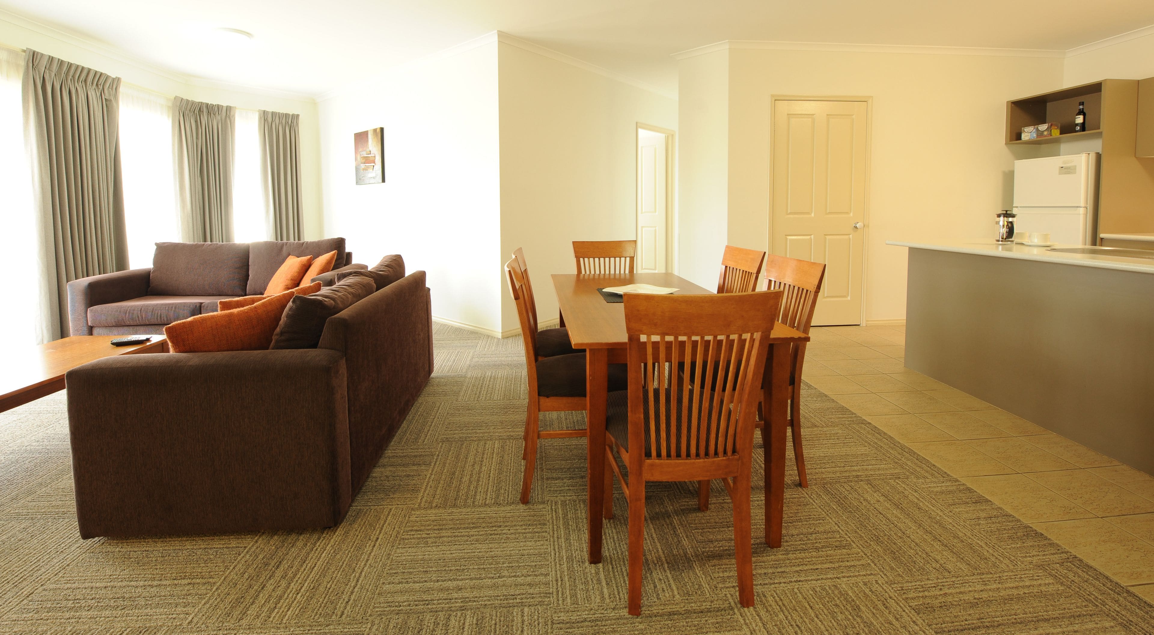 three bedroom standard apartment | living area | lcd tv, dvd player