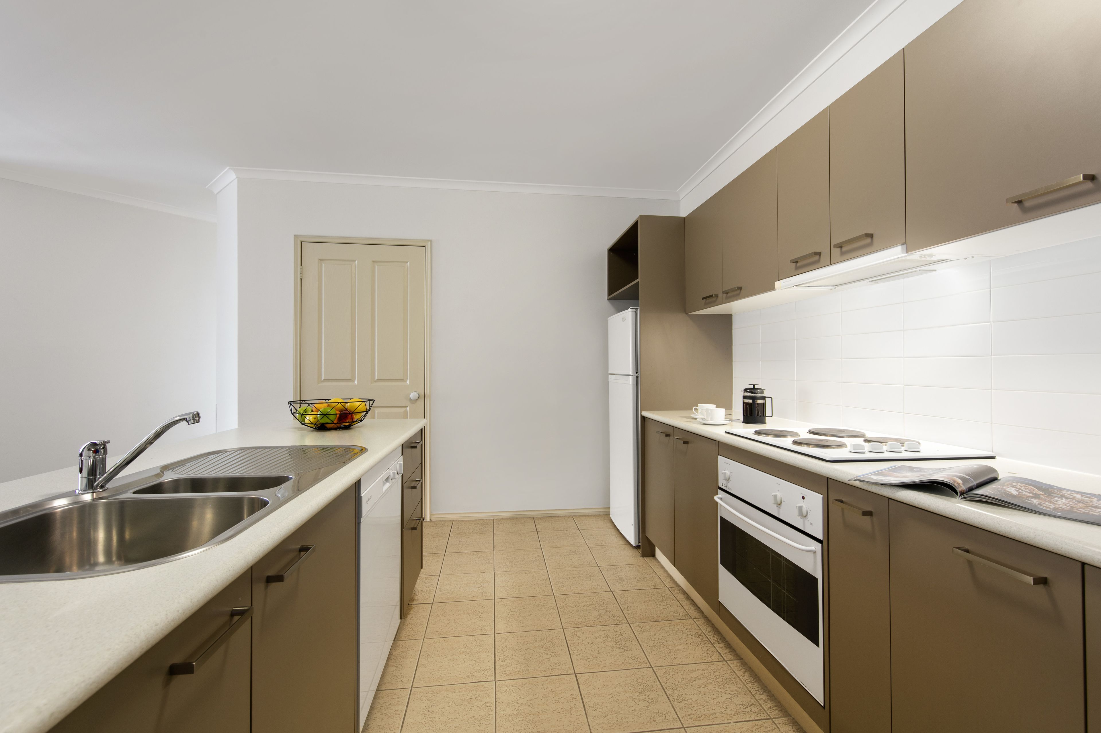 three bedroom standard apartment | private kitchenette | full-sized fridge, microwave, oven, stovetop