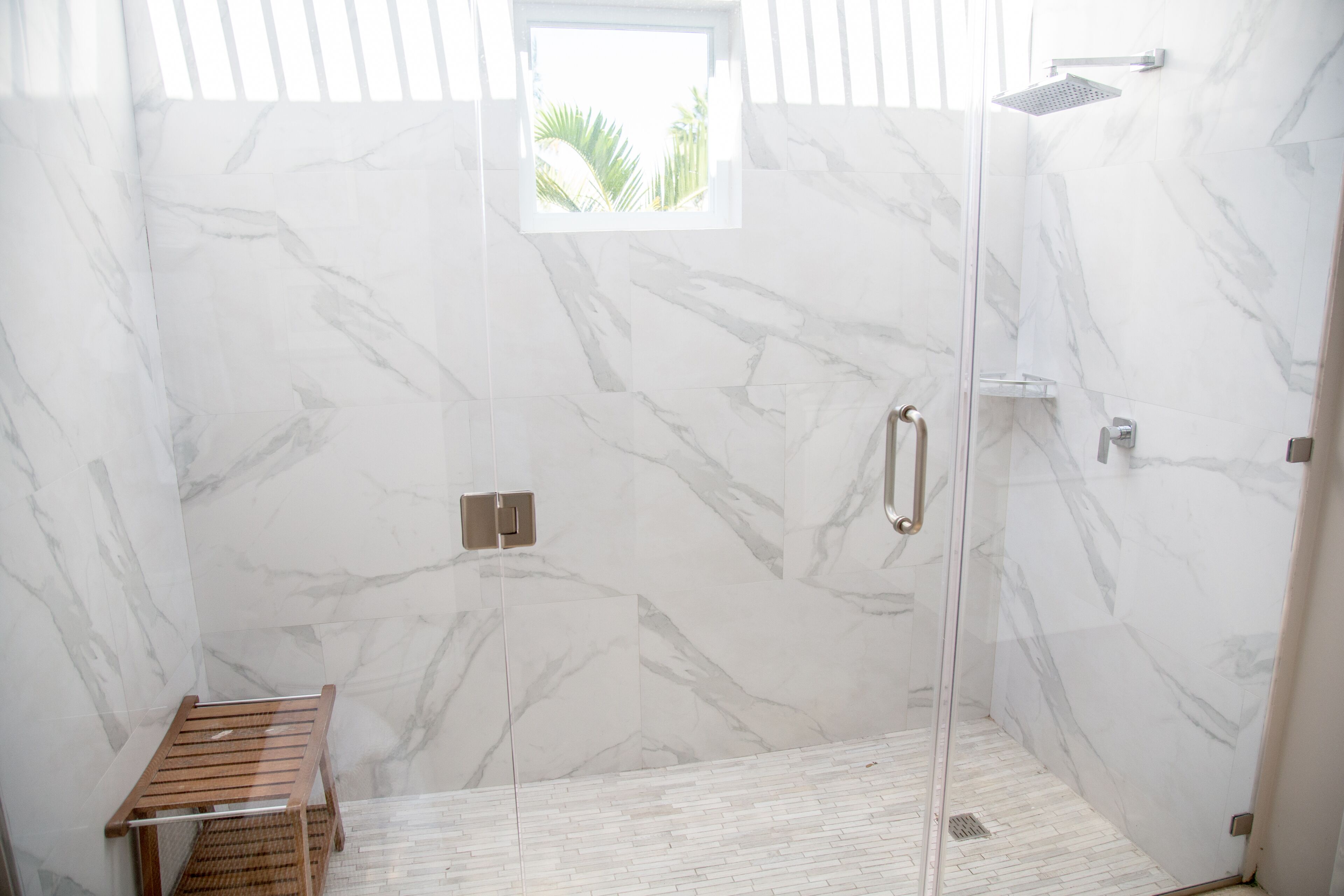 combined shower/bathtub, designer toiletries, hair dryer, towels