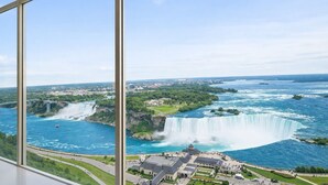 A view of Niagara Falls from a high vantage point, including the surrounding cityscape and the falls themselves.