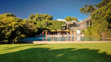 2 outdoor pools, pool umbrellas, pool loungers