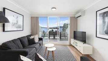 Apartment, 2 Bedrooms | Living area | TV