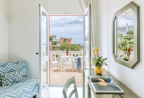 Triple Room, Sea View | In-room safe, desk, blackout drapes, free WiFi