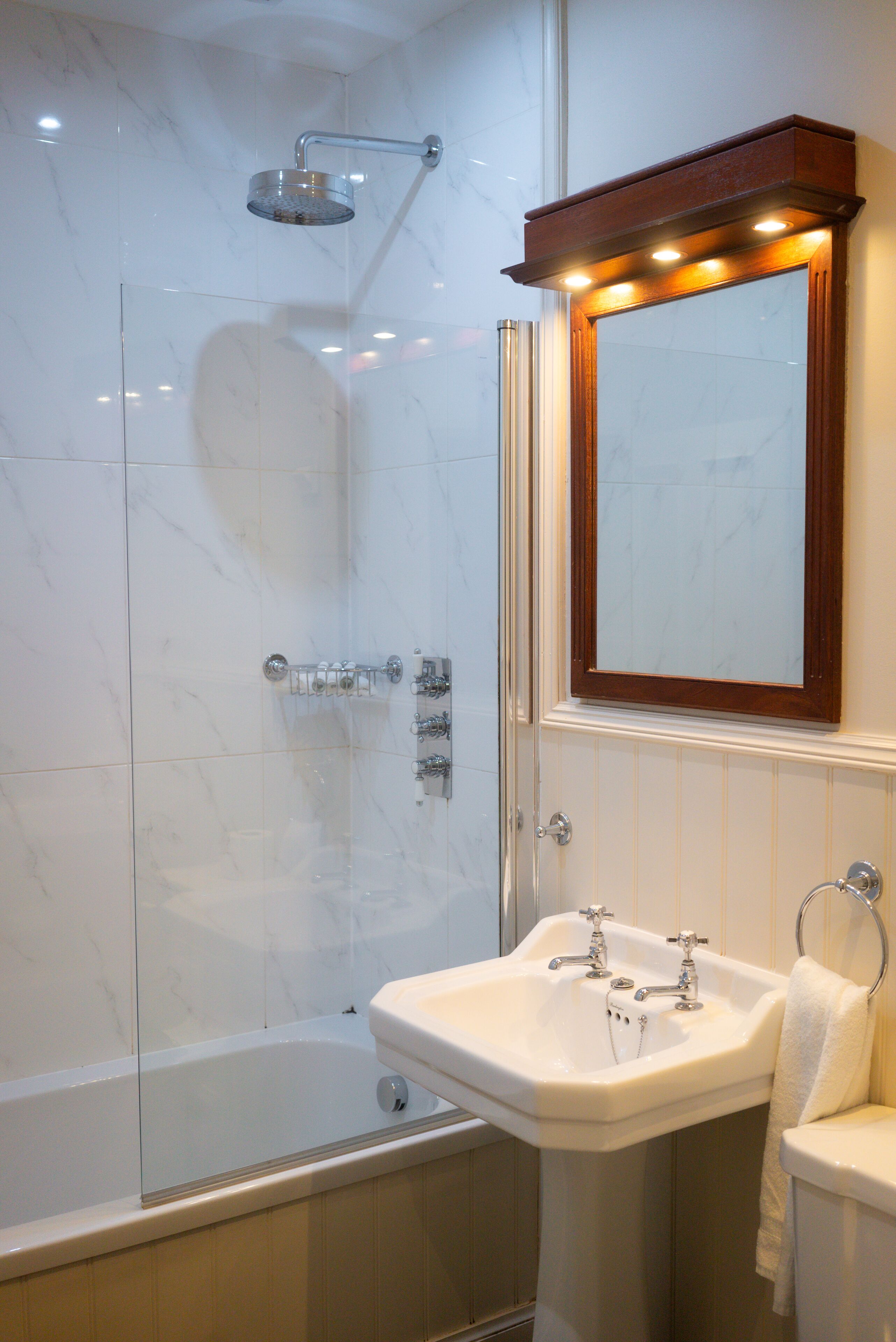 designer toiletries, hair dryer, bathrobes, towels