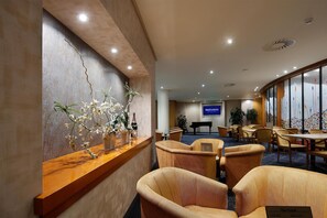 Rooftop bar, pool views, open daily
