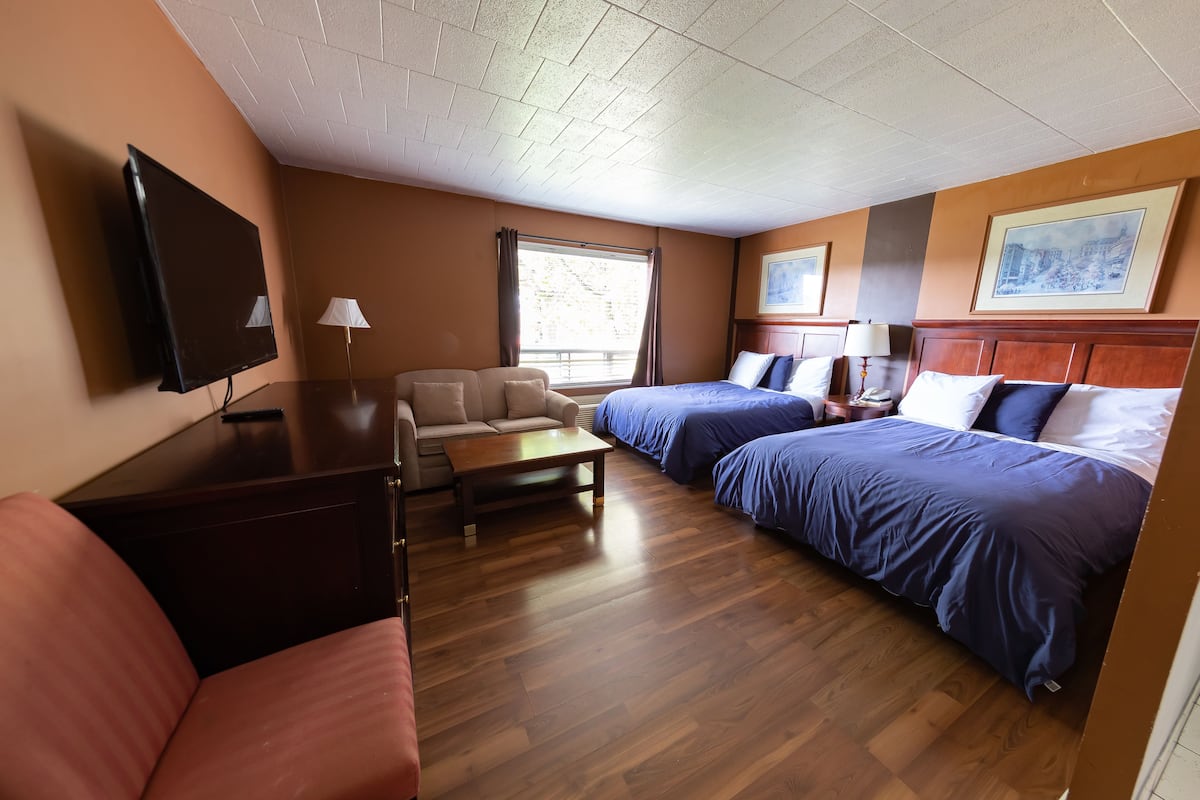 Family Room, Multiple Beds, Private Bathroom | Down comforters, desk, blackout drapes, iron/ironing board