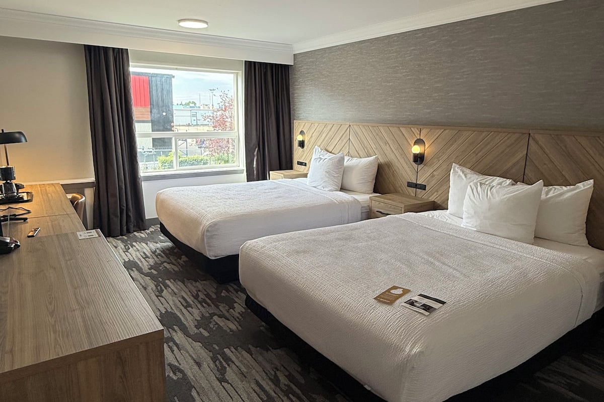 Standard Room, 2 Queen Beds | 1 bedroom, in-room safe, desk, laptop workspace