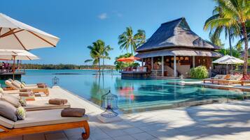 2 outdoor pools, pool umbrellas, pool loungers