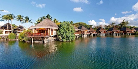 Premium bedding, minibar, in-room safe, desk. Constance Prince Maurice