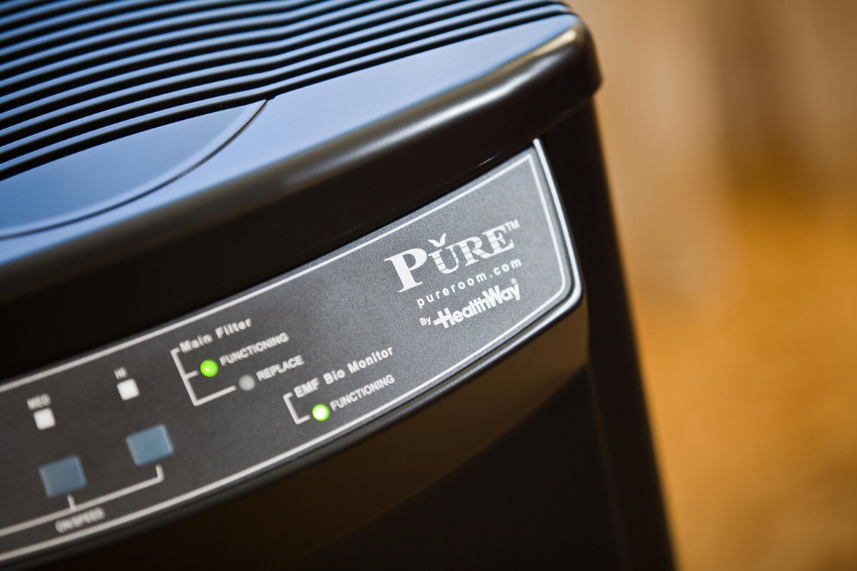 A black electronic device with labels and indicators, including "Main Filter," "EMF Bio Monitor," and "Functioning."