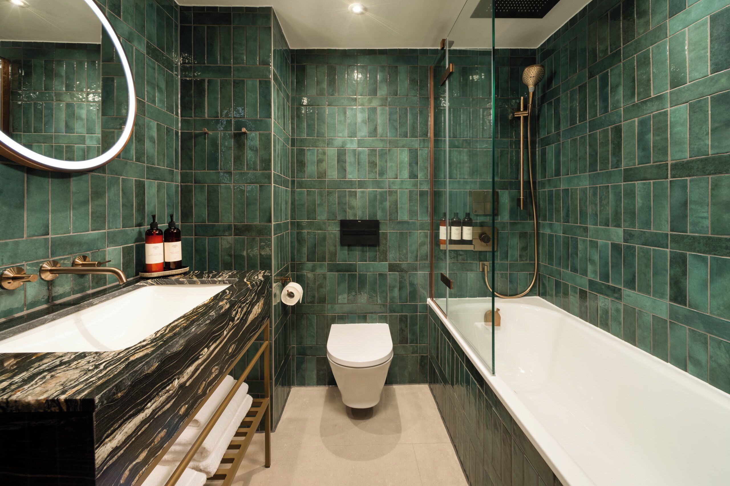 Designer toiletries, hair dryer, towels, soap