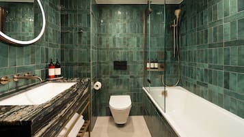 Designer toiletries, hair dryer, towels, soap