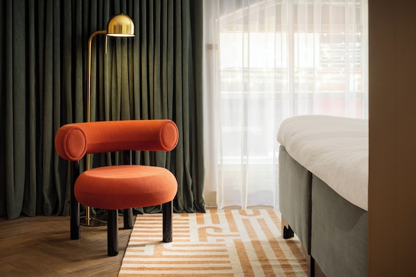 Free minibar, in-room safe, laptop workspace, iron/ironing board