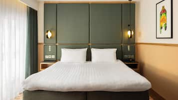 Free minibar, in-room safe, laptop workspace, iron/ironing board