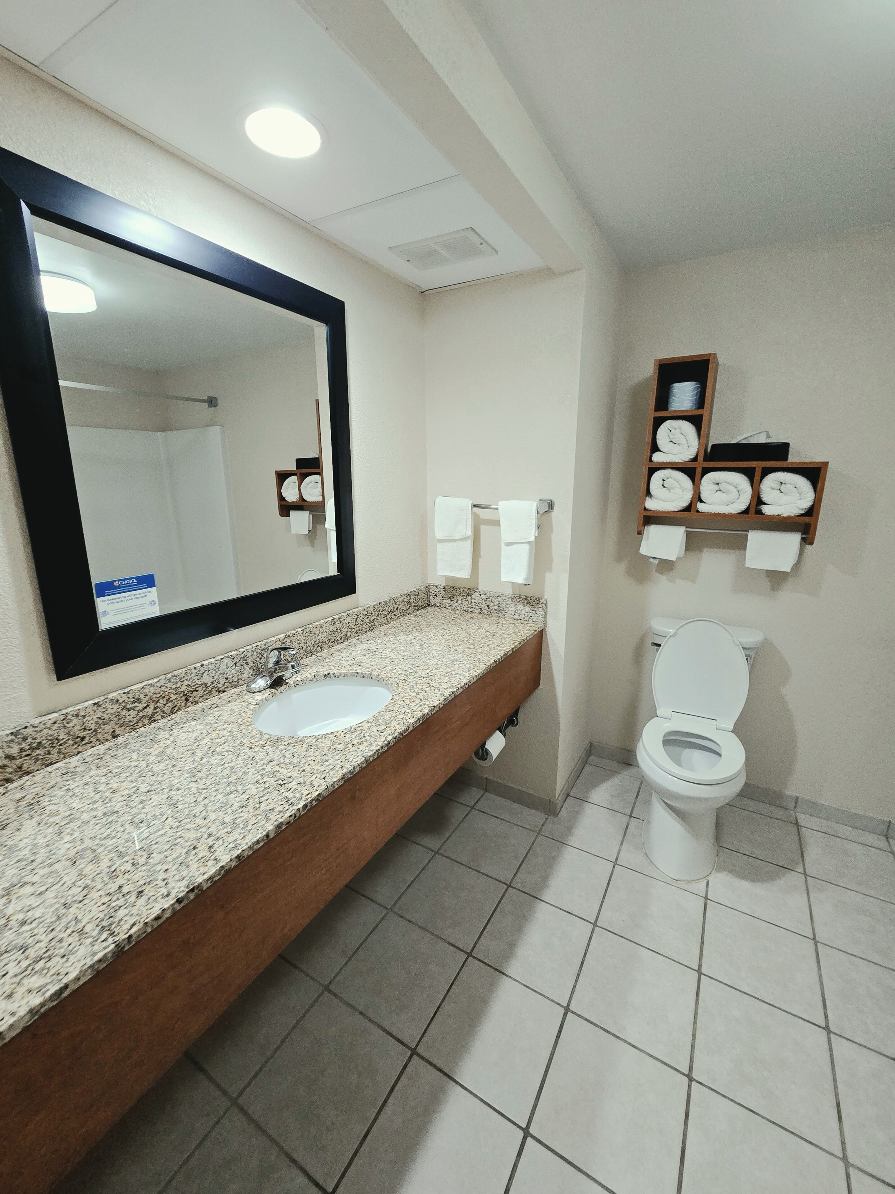 Suite, 1 King Bed, Non Smoking | Bathroom | Free toiletries, hair dryer, towels
