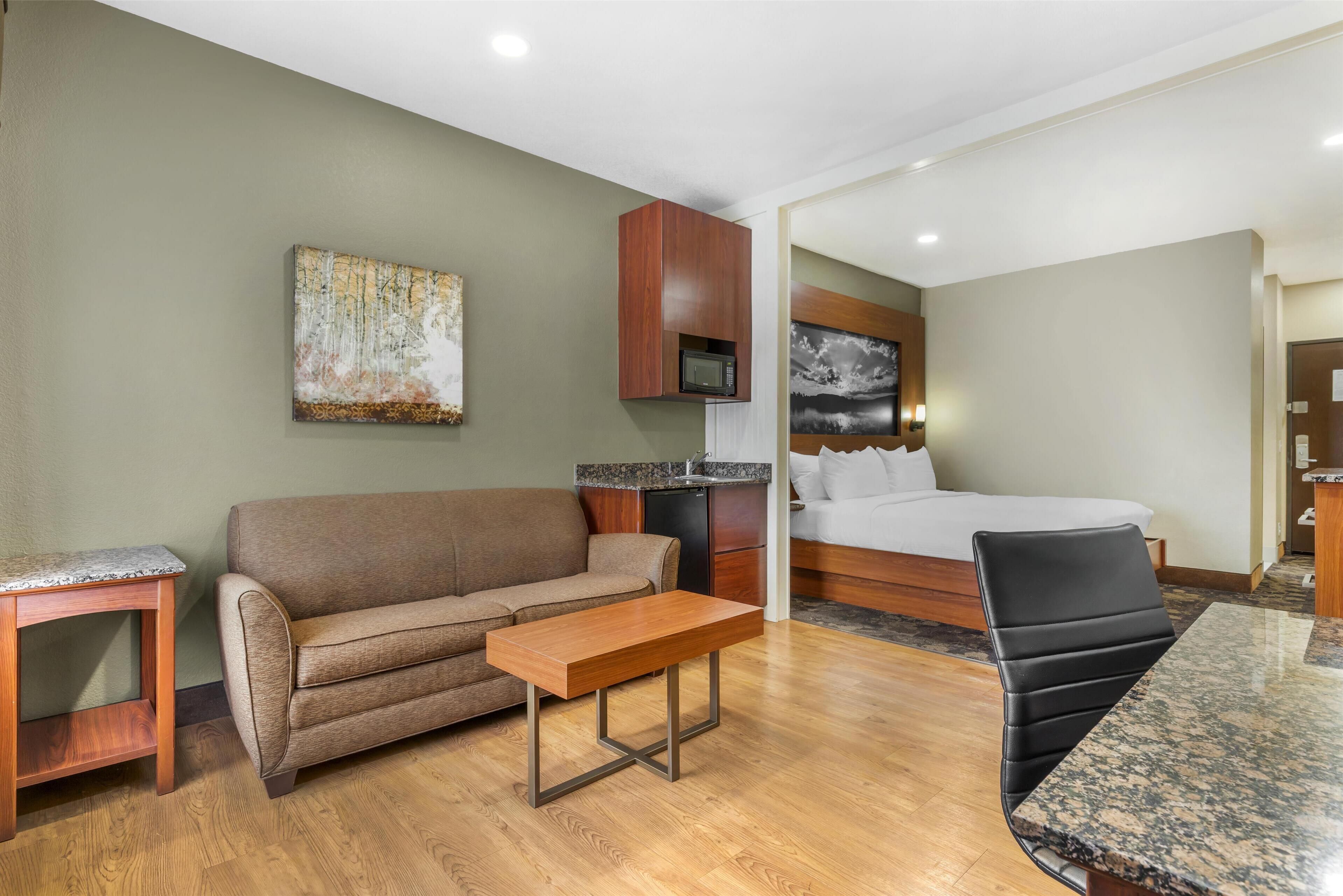 desk, laptop workspace, blackout curtains, iron/ironing board