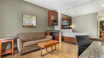 Desk, laptop workspace, blackout drapes, iron/ironing board