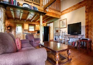 Group Cabin | Living area | 42-inch flat-screen TV with satellite channels, TV - The Smokehouse Lodge and Cabins (Monteagle)