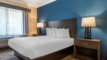 Desk, laptop workspace, blackout curtains, iron/ironing board