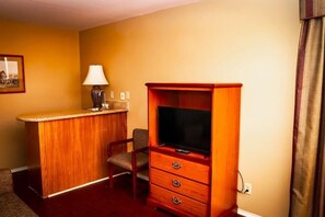 Suite, 1 King Bed, Non Smoking | Living area | 32-inch flat-screen TV with satellite channels, TV