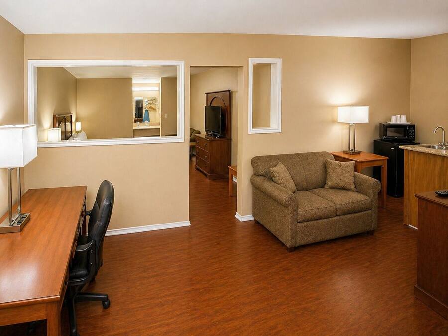 Suite, 1 King Bed, Non Smoking | Individually furnished, desk, laptop workspace, blackout drapes