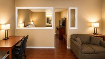 Suite, 1 King Bed, Non Smoking | Individually furnished, desk, laptop workspace, blackout drapes