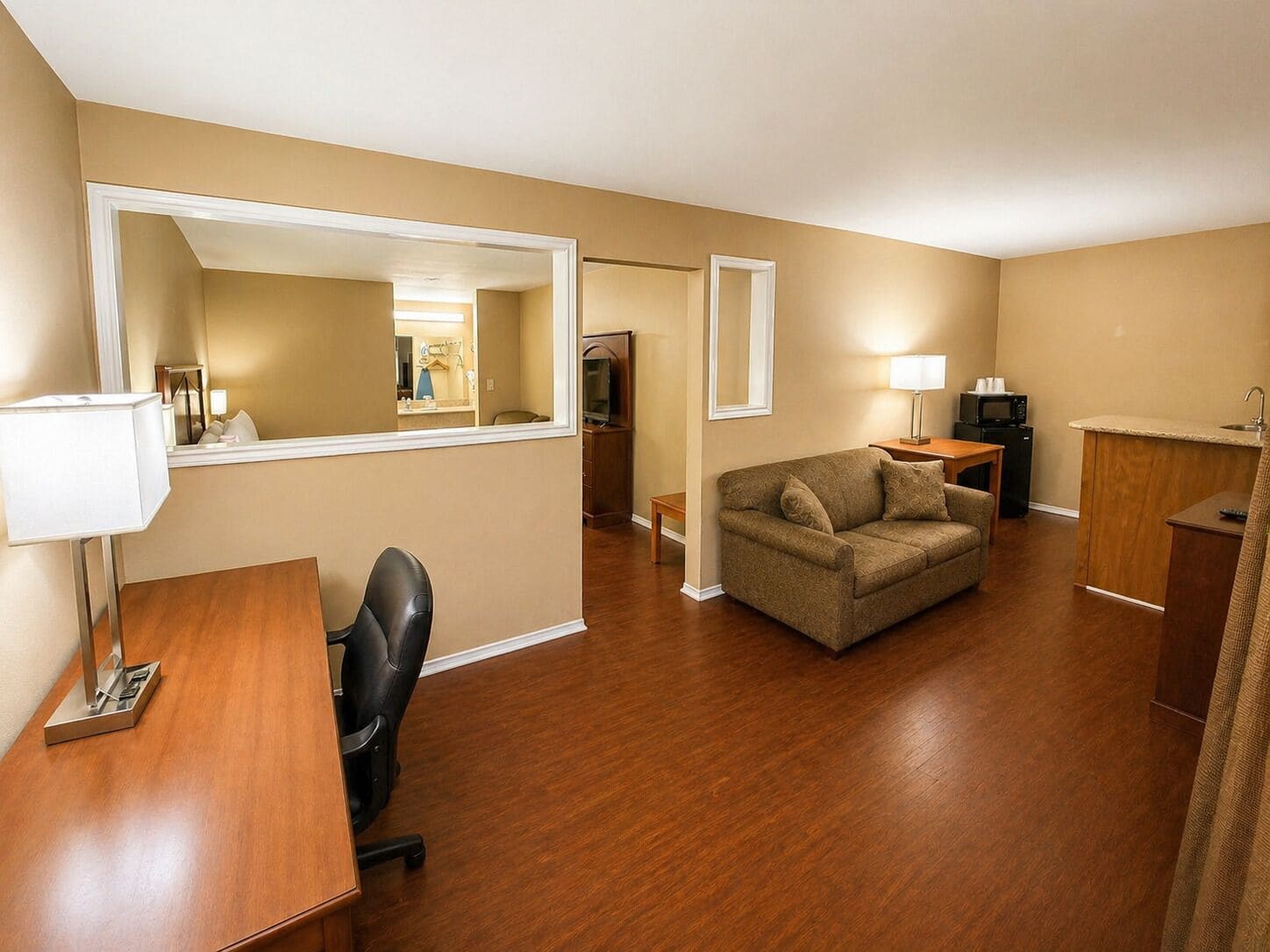 Suite, 1 King Bed, Non Smoking | Individually furnished, desk, laptop workspace, blackout drapes
