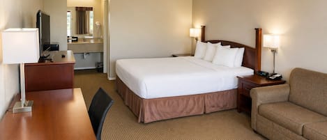 Chambre, 1 trĂšs grand lit, non-fumeur | Ameublement unique, bureau, espace de travail pour ordinateurs portables