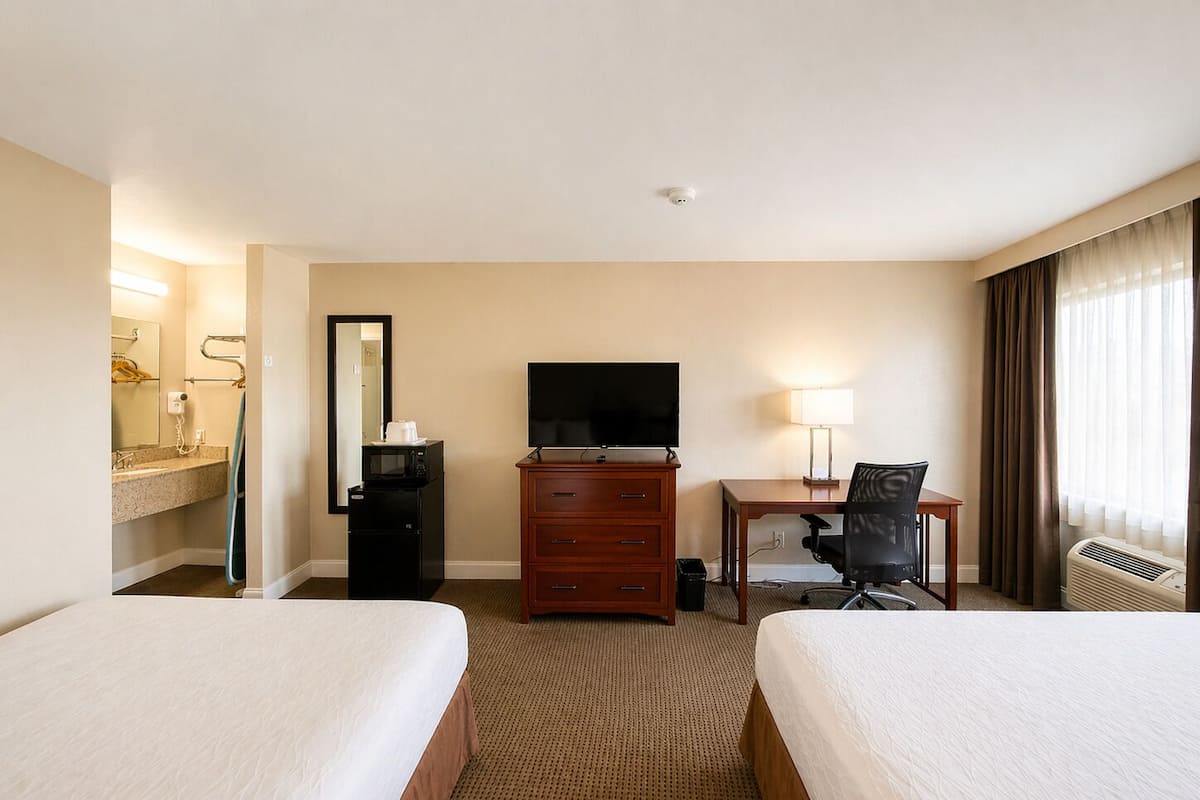 Individually furnished, desk, laptop workspace, blackout drapes