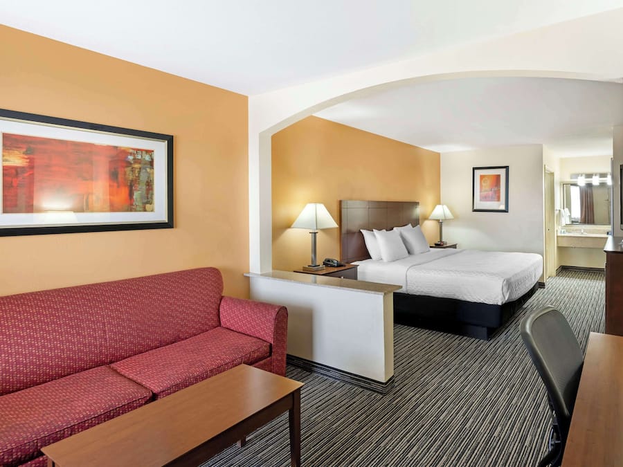 Suite, 1 King Bed, Non Smoking, Microwave | Pillowtop beds, desk, laptop workspace, soundproofing