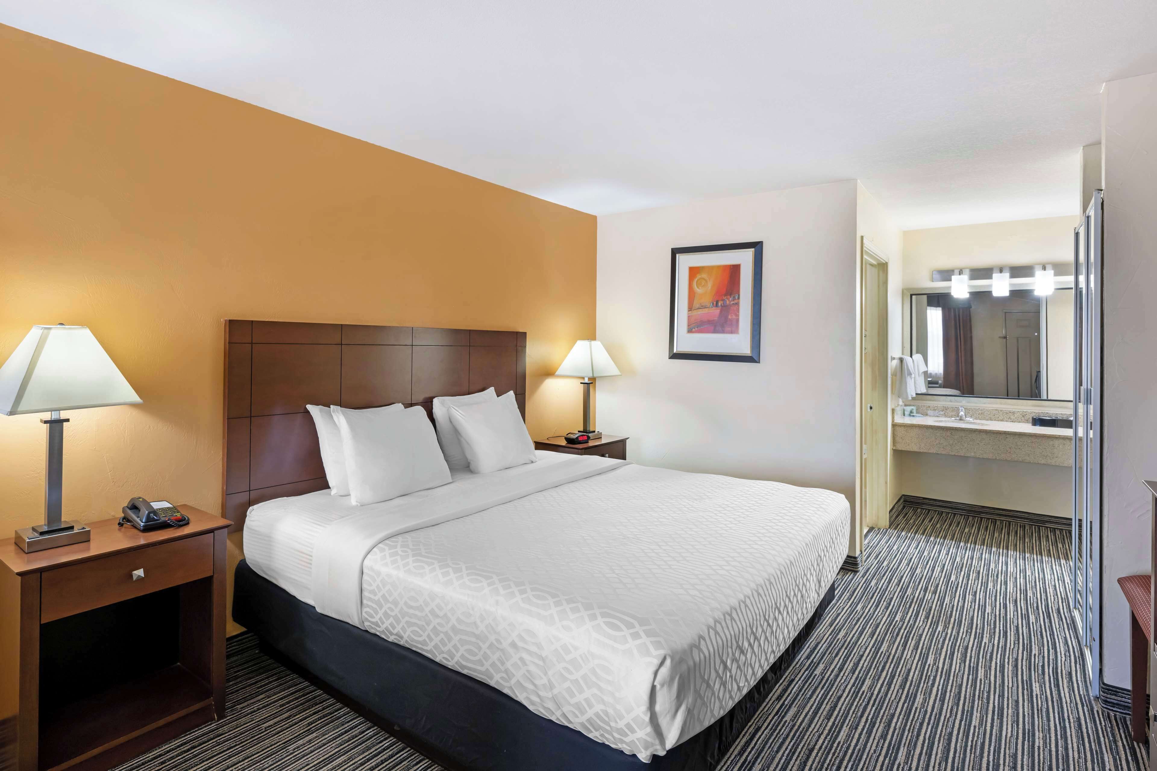 suite, 1 king bed, non smoking, microwave | pillow-top beds, desk, laptop workspace, soundproofing