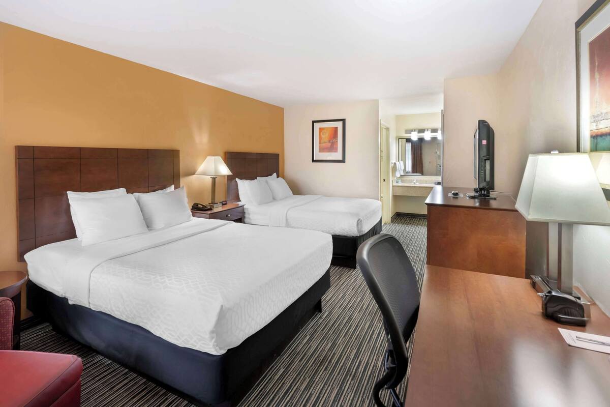 standard room, 2 queen beds, non smoking, refrigerator & microwave | pillow-top beds, desk, laptop workspace, soundproofing