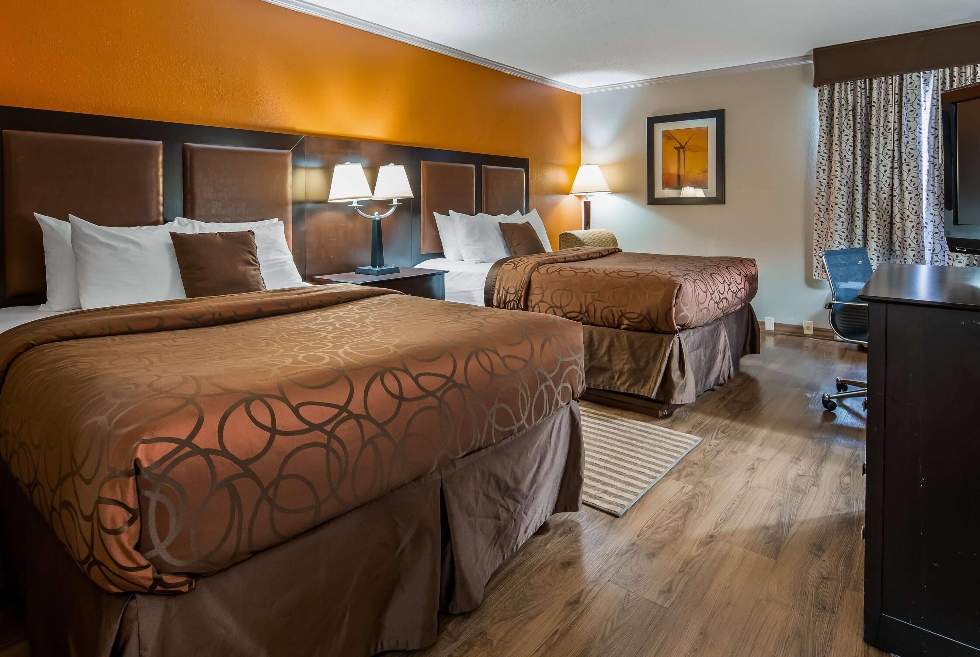 Room, 2 Queen Beds, Non Smoking (Pet-friendly) | Desk, laptop workspace, iron/ironing board, rollaway beds