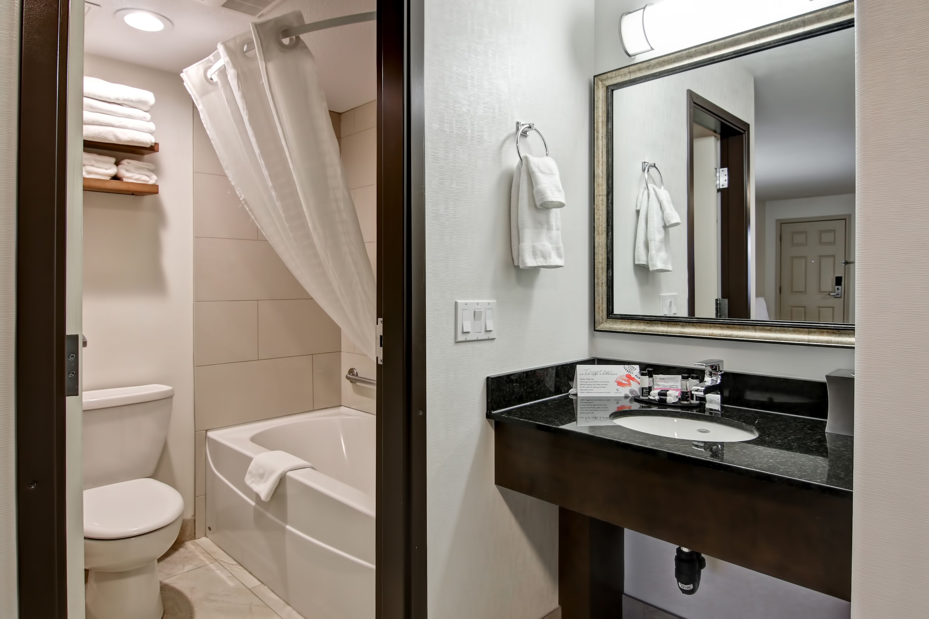 combined shower/bathtub, free toiletries, towels