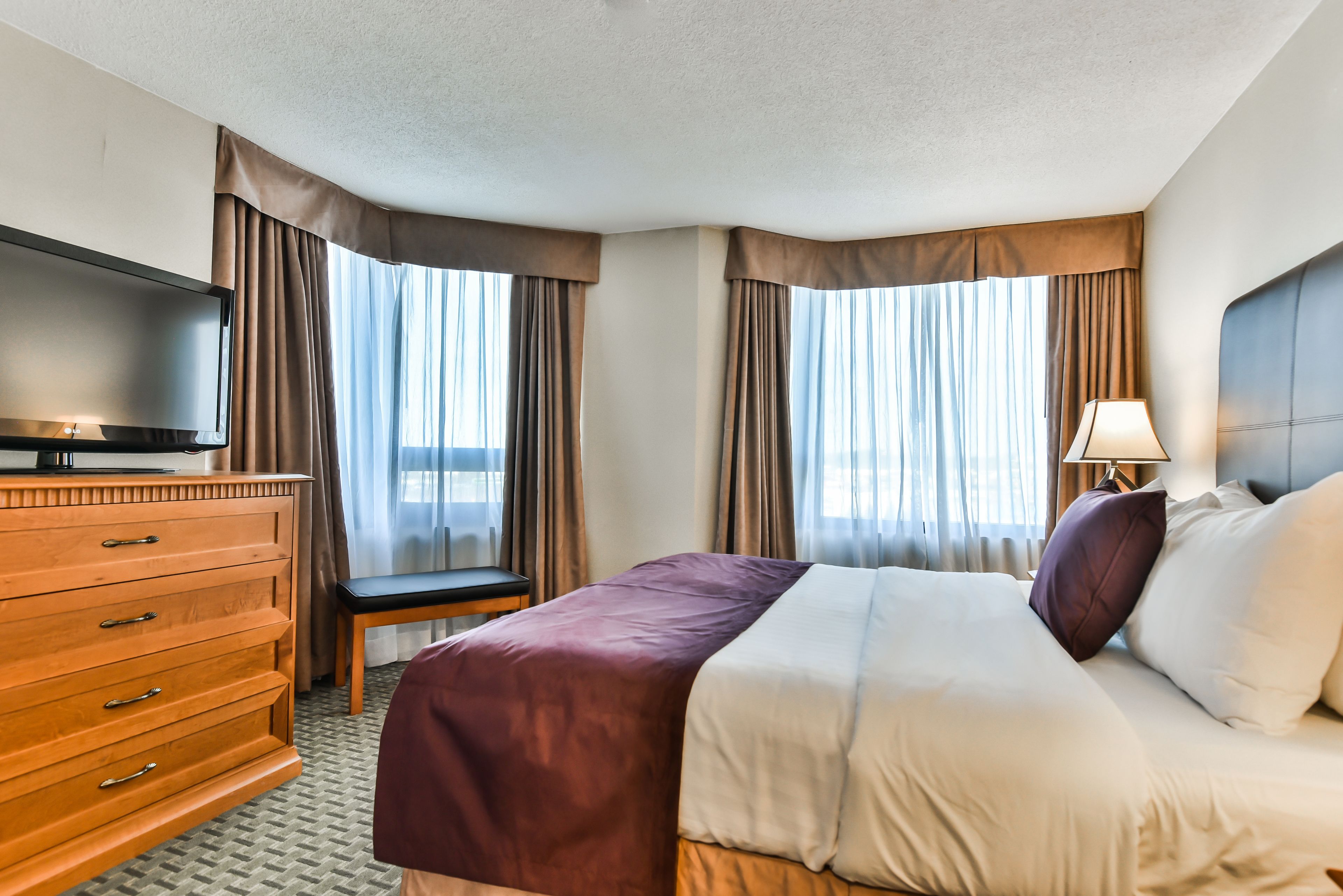 suite, 1 queen bed, non smoking, refrigerator | premium bedding, blackout curtains, iron/ironing board