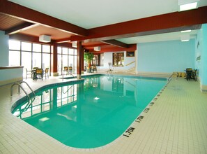 Indoor pool, open 6:00 AM to 10:00 PM, pool loungers