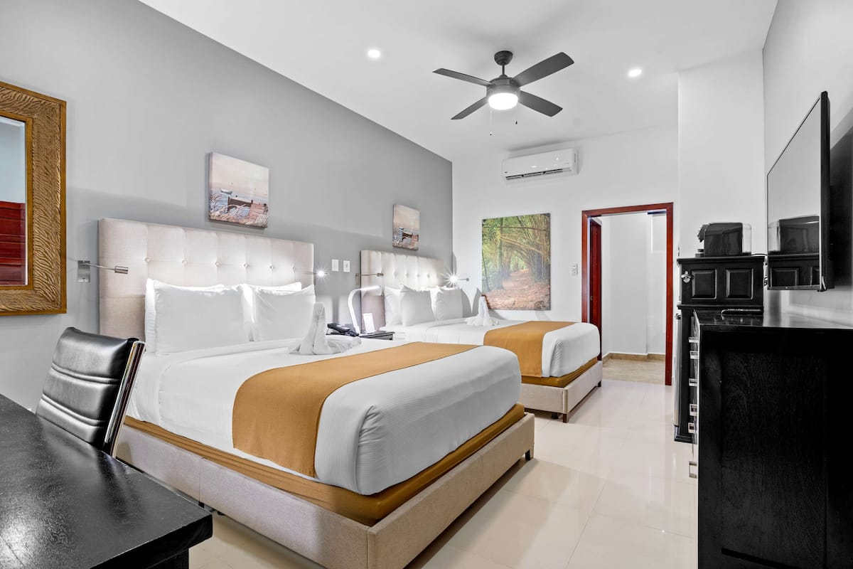 Premium Room, 2 Queen Beds, Non Smoking, Refrigerator & Microwave | In-room safe, desk, laptop workspace, blackout drapes