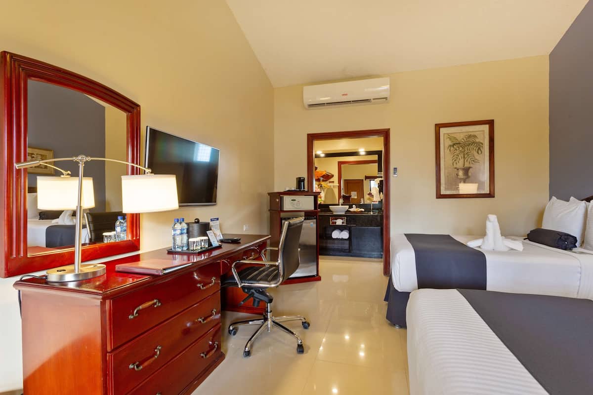 Standard Room, 2 Queen Beds, Non Smoking | In-room safe, desk, laptop workspace, blackout drapes