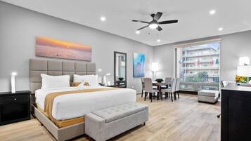 Junior Suite, 1 King Bed, Non Smoking, Jetted Tub (Living Room) | In-room safe, desk, laptop workspace, blackout curtains