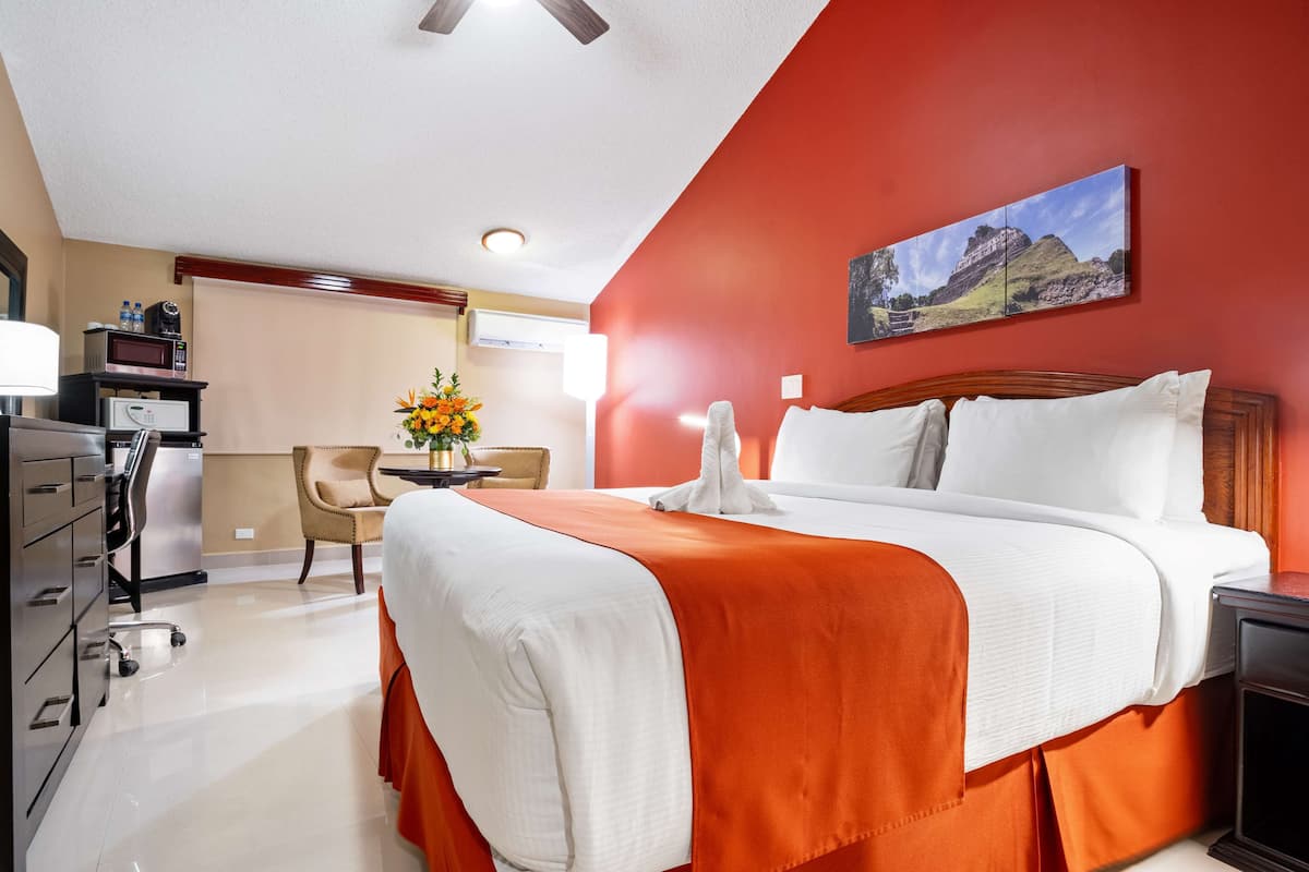 Deluxe Room, 1 King Bed, Non Smoking, Refrigerator | In-room safe, desk, laptop workspace, blackout drapes