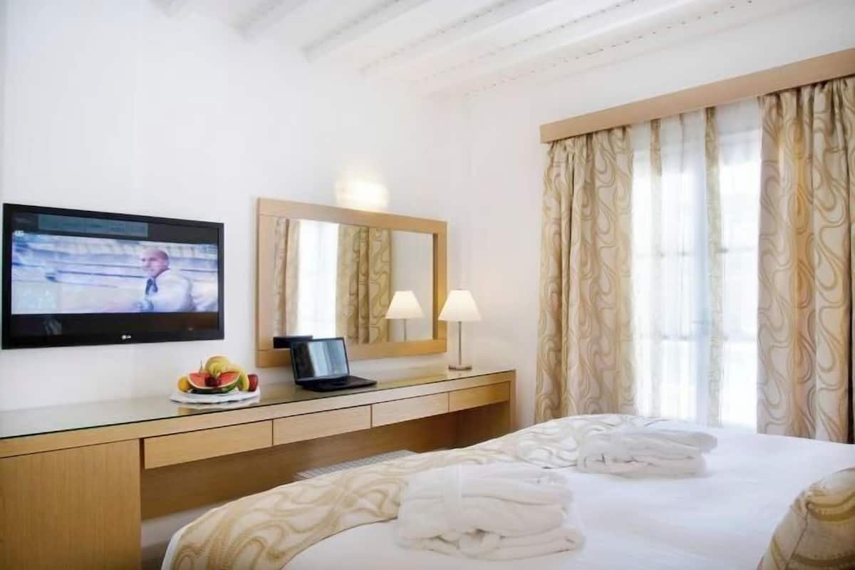 Egyptian cotton sheets, premium bedding, down duvets, memory-foam beds