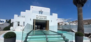 Seasonal outdoor pool, open 10:00 AM to 8:00 PM, pool umbrellas