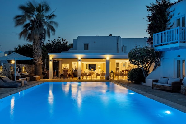 Seasonal outdoor pool, open 10:00 AM to 8:00 PM, pool umbrellas