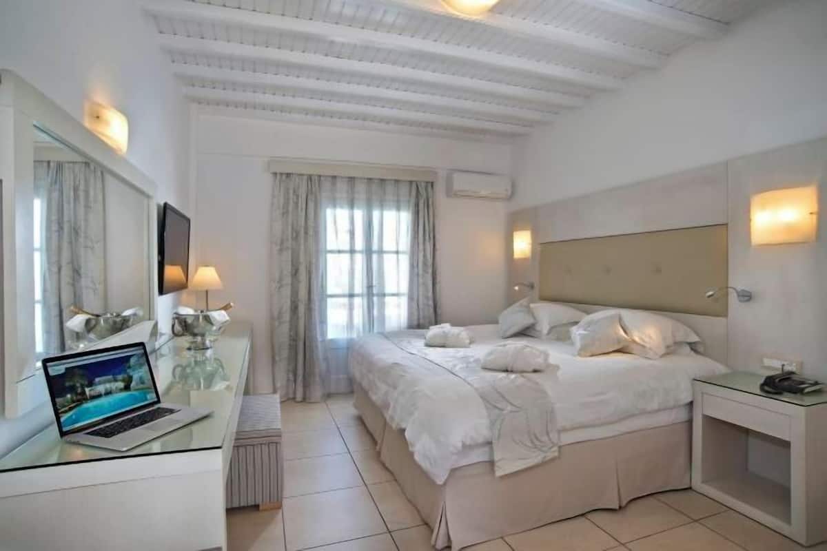 Egyptian cotton sheets, premium bedding, down duvets, memory-foam beds