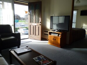 Twin Room, 1 Bedroom | Living area | 43-inch plasma TV with cable channels, TV, DVD player